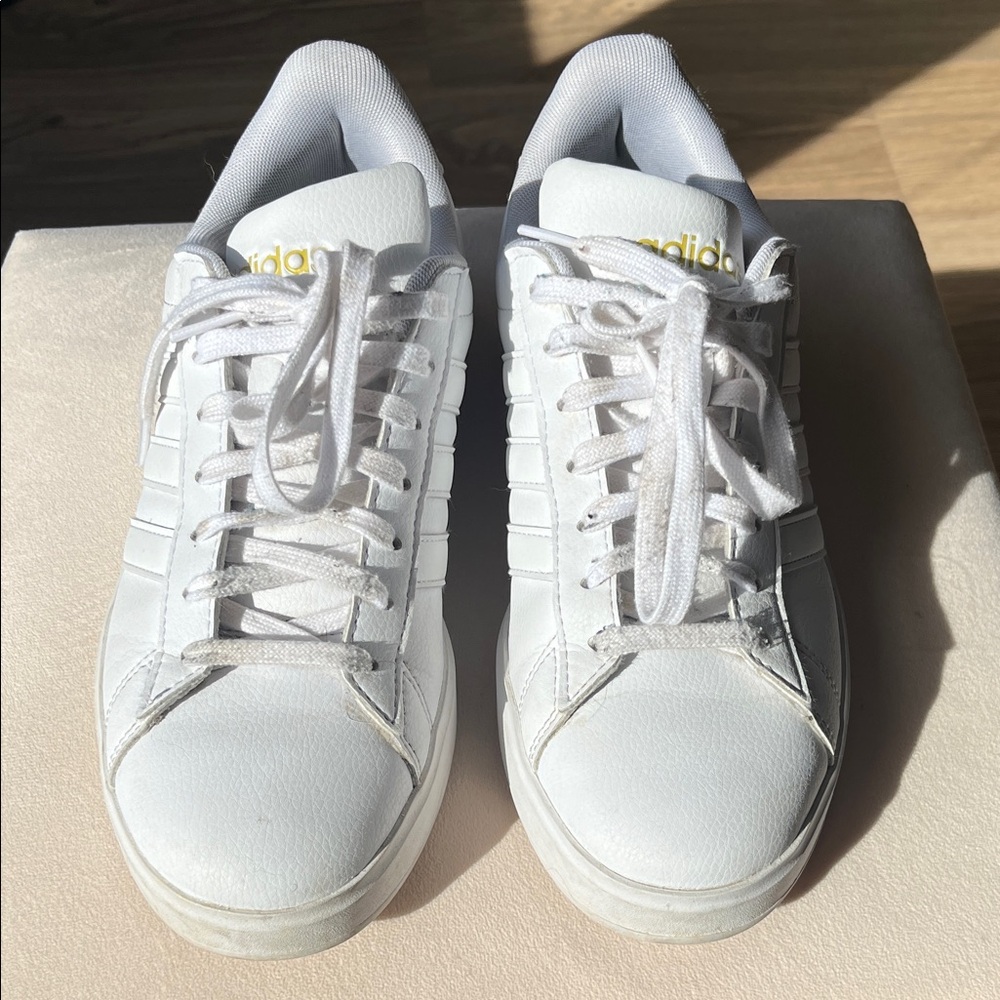 Adidas White Sneakers with Gold Accents